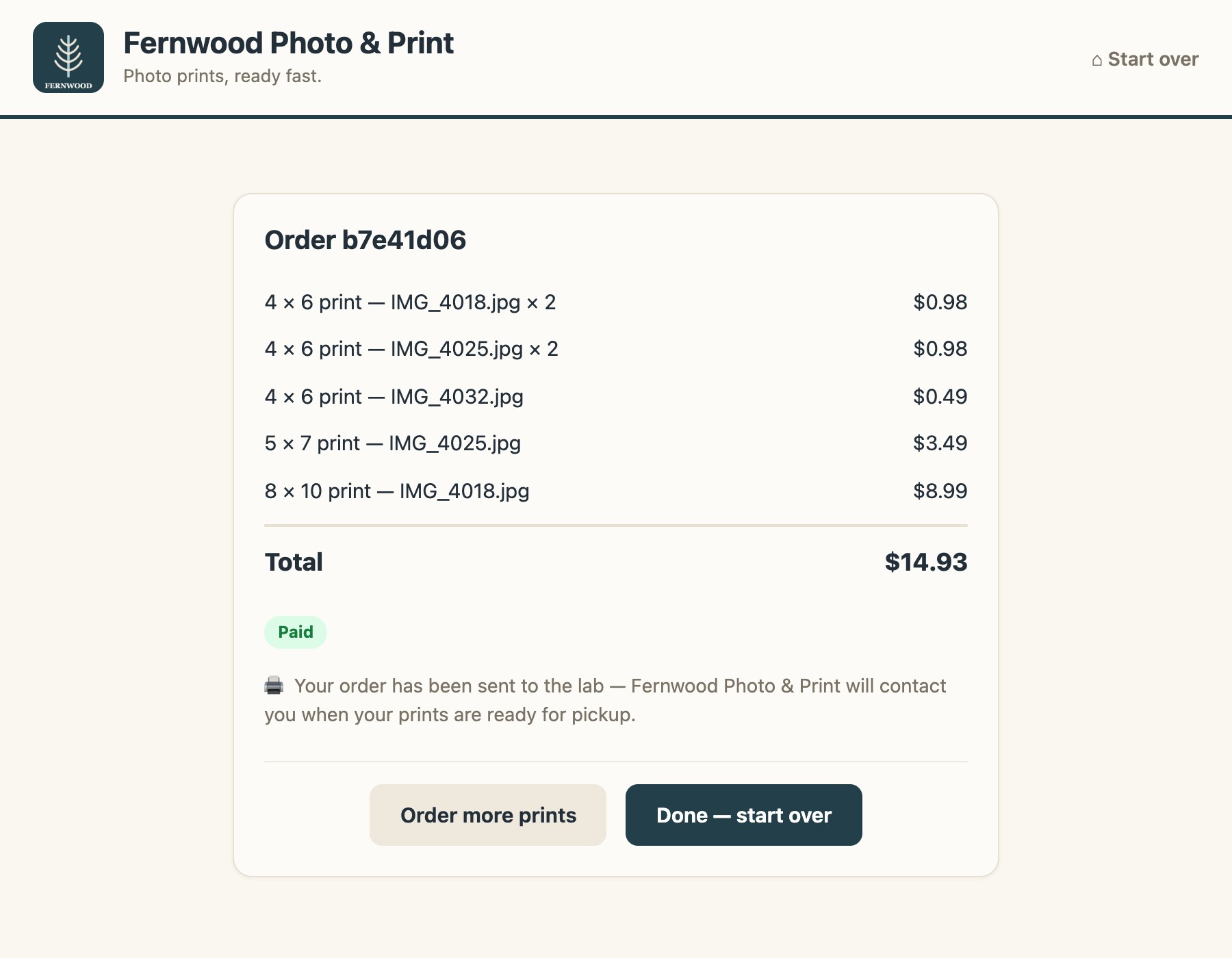 The kiosk after payment: the same order marked Paid, Your order has been sent to the lab, and Order more prints and Done, start over buttons